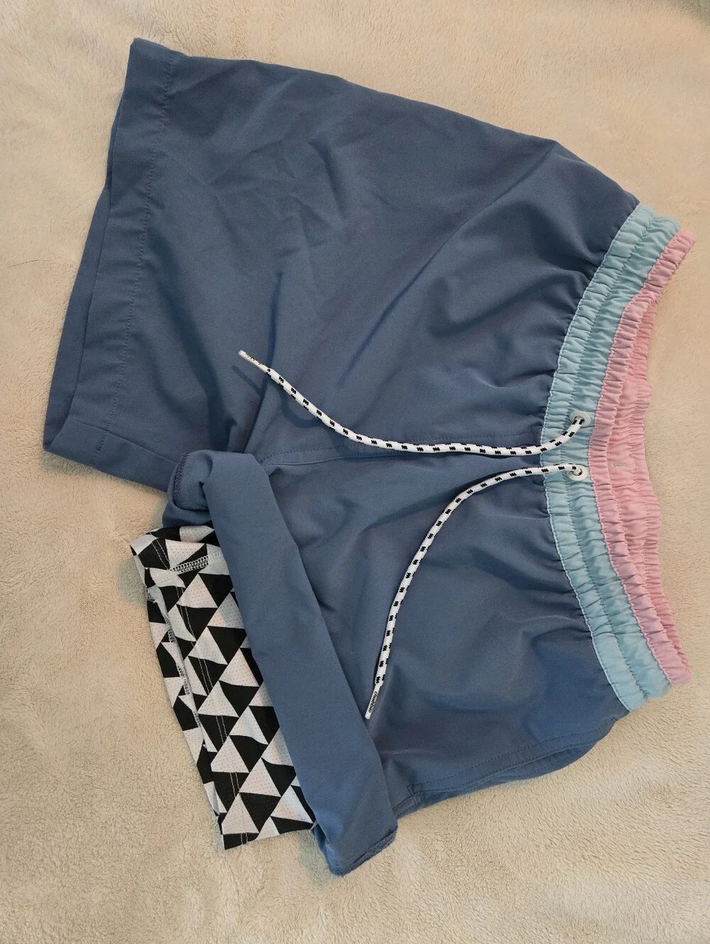 chubbies Blue Swim Trunks with Pink and Light Blue Waistband
